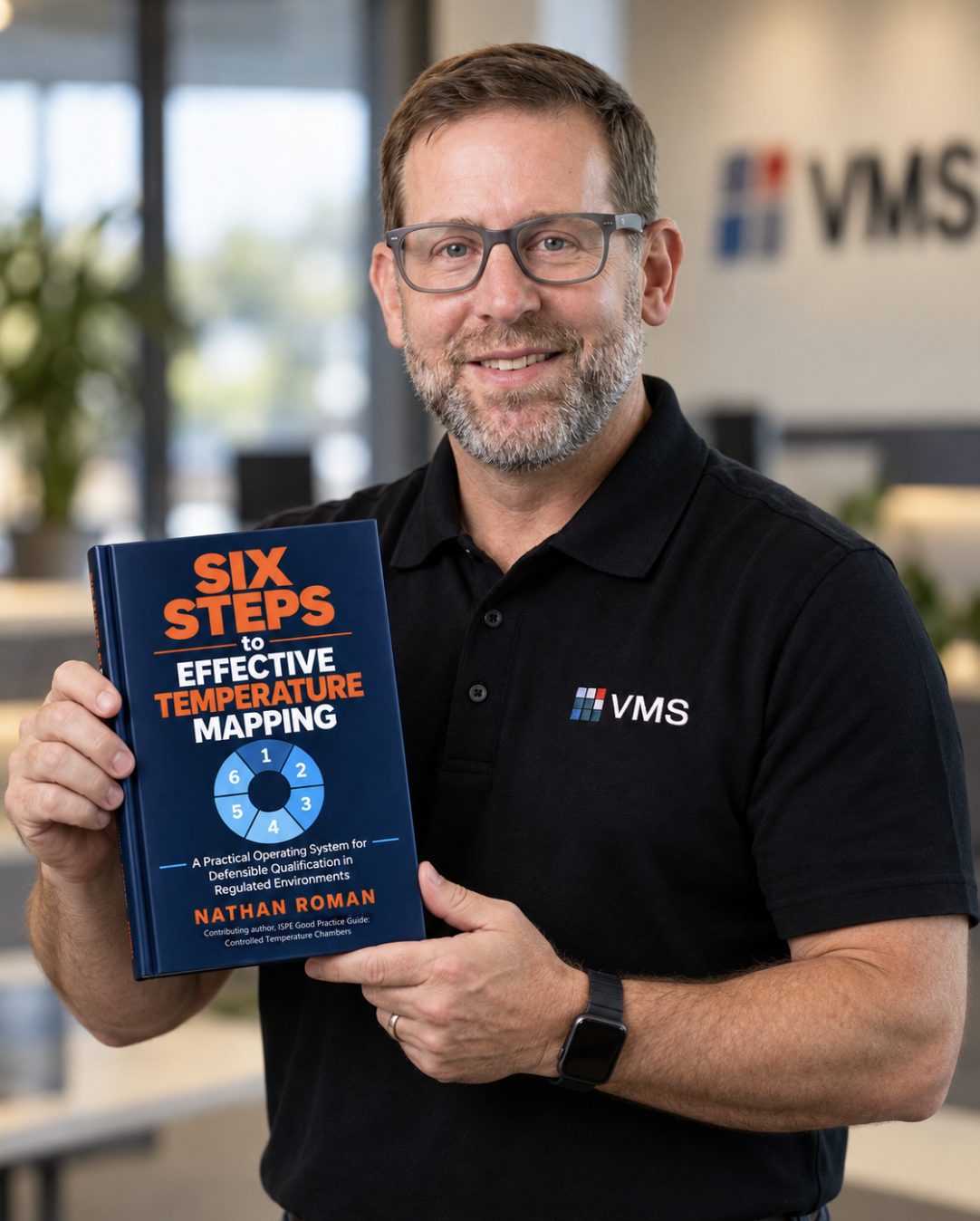 Nathan Roman smiling and holding his book, Six Steps to Effective Temperature Mapping